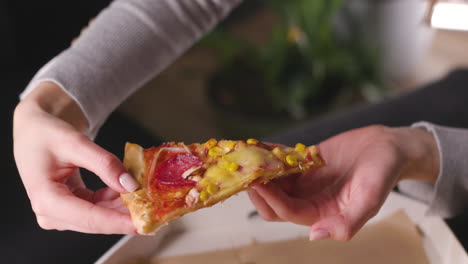 hungry woman having a break and eating tasty pizza 2