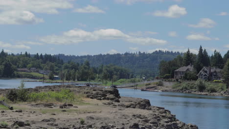 timelapse of river and boats with clouds moving through