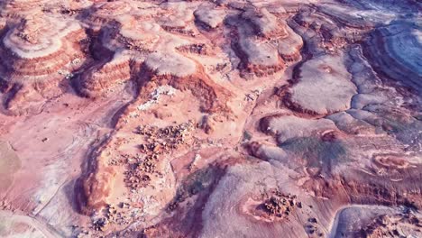 textured background of uneven surface of sandstone cliffs in sunlight