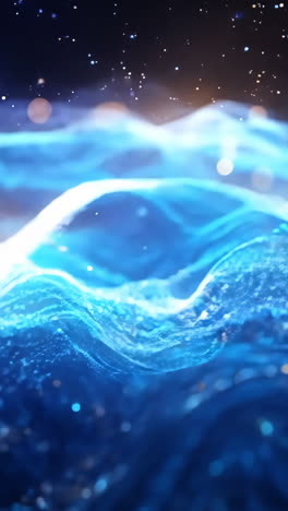 the image is a blue and orange wave with a lot of sparkles. the blue color is dominant and the orange color is scattered throughout the wave. the sparkles add a sense of movement