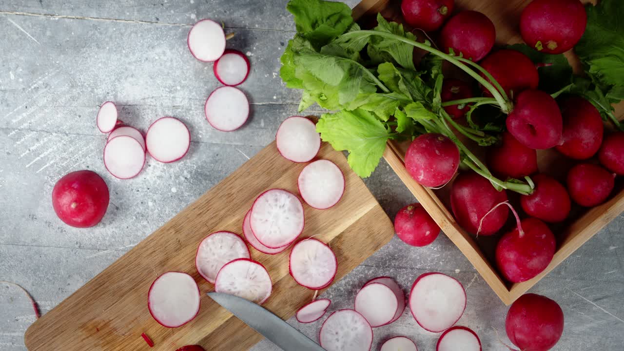 Sliced on a cutting Board radish slowly rotates.