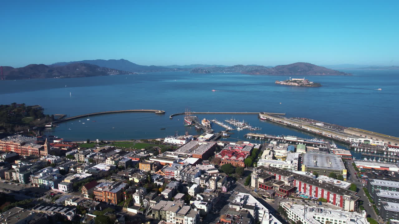 Drone Shot of San Francisco USA Piers, Museum Ships, Fisherman's Wharf and Alcatraz Island in Bay