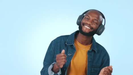 Black-man,-headphones-and-energy-with-dancing