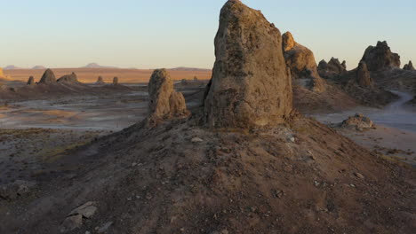 desert landscape broken up by huge tufa spires at trona pinnacles, california