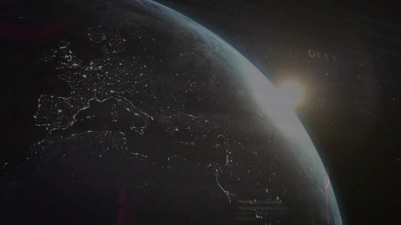 Rotating Earth revealing red circuit overlays while rising sun casting daylight across continents