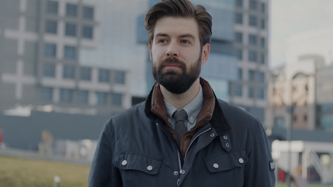 Smiling Man Giving Okay Sign in City