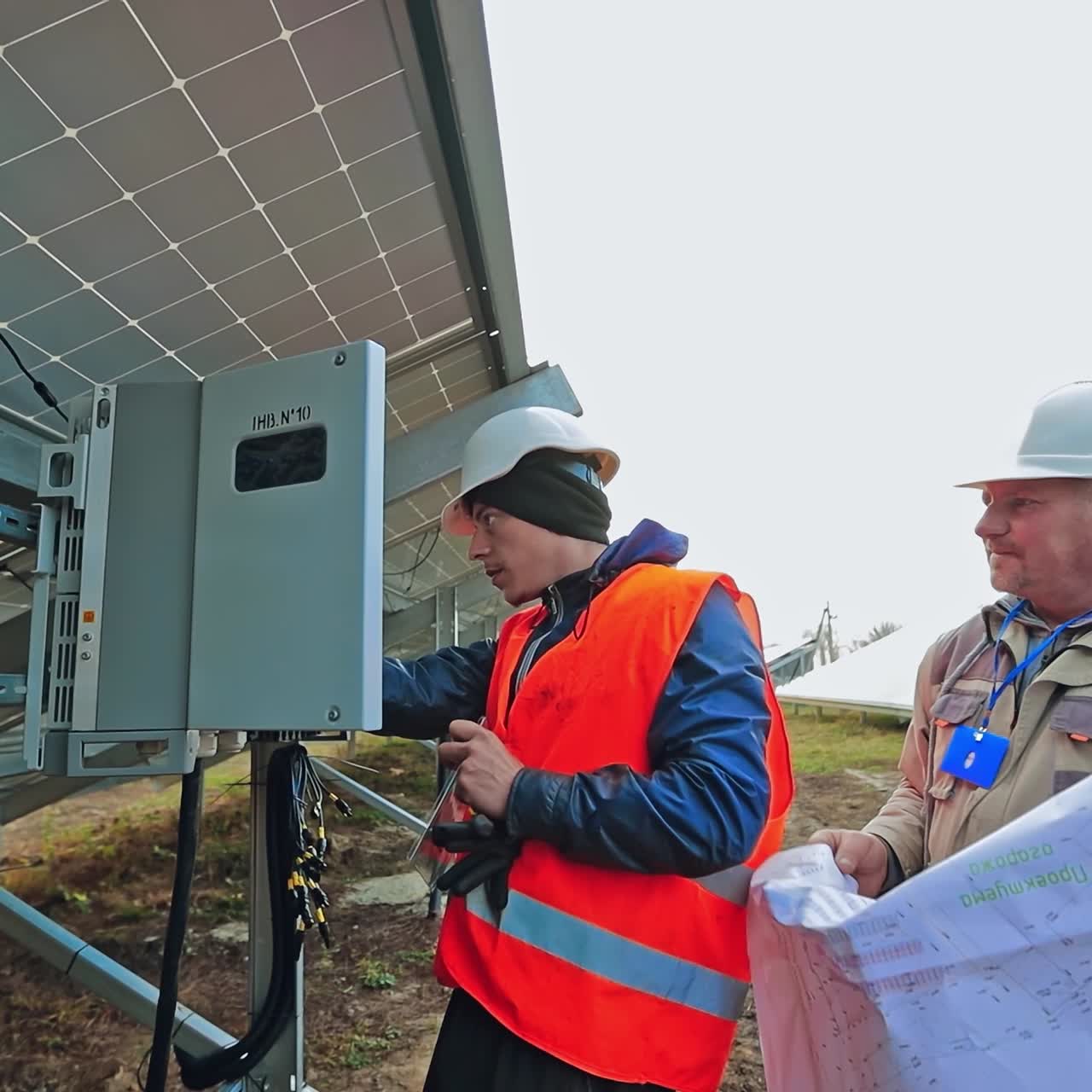 Man working at solar power station