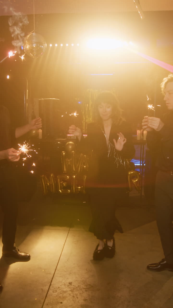 People celebrating with sparklers