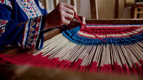 women weaving traditional carpets and textiles