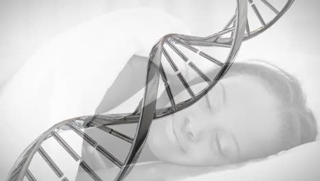 Animation-of-dna-strand-spinning-over-sleeping-woman