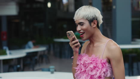 person using mobile phone outdoors