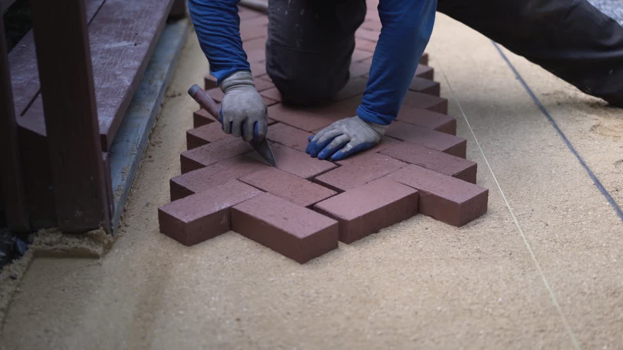Laying Brick Pavers in a Herringbone Pattern