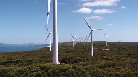 trucking shot in front of the wind farm in albany, australia