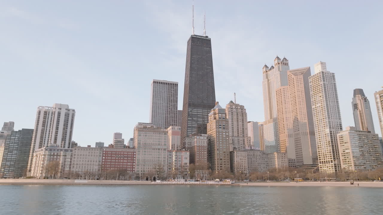 Establishing shot of Chicago at sunrise. Shot on Lake Michigan