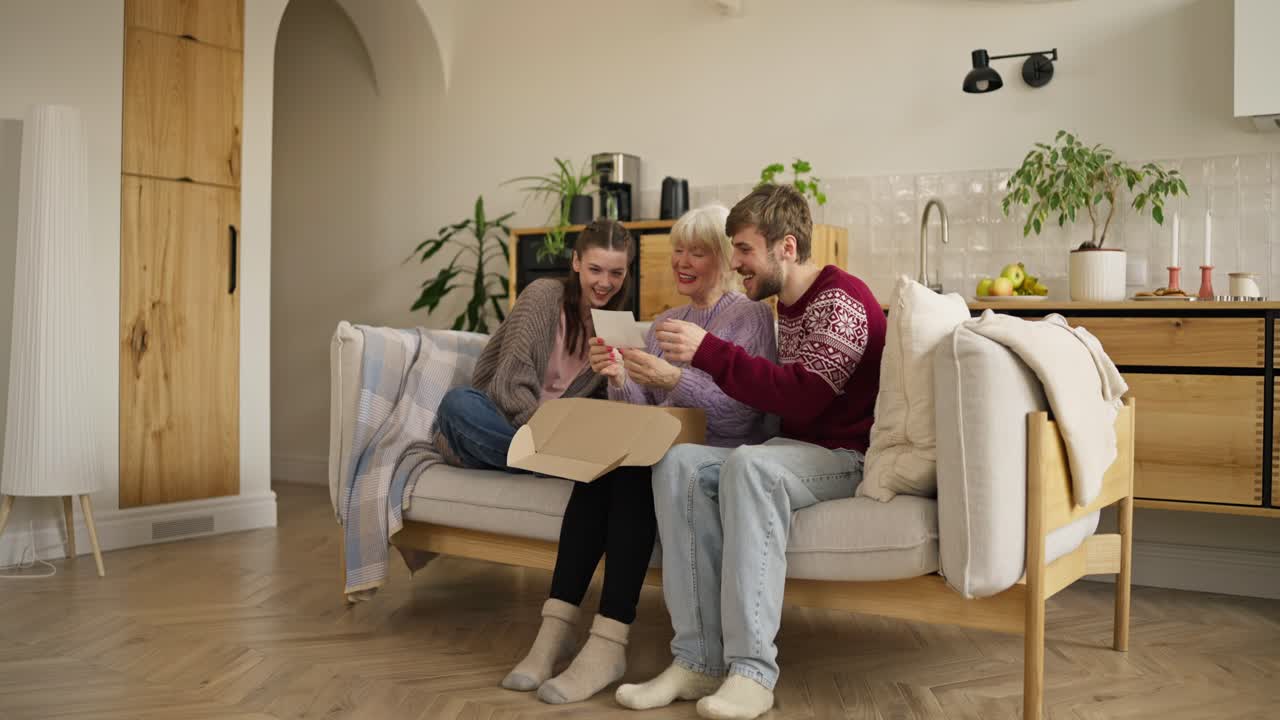 Family Opening a Gift Together