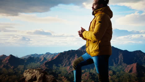 determined traveler enjoys the solitude of a mountain summit