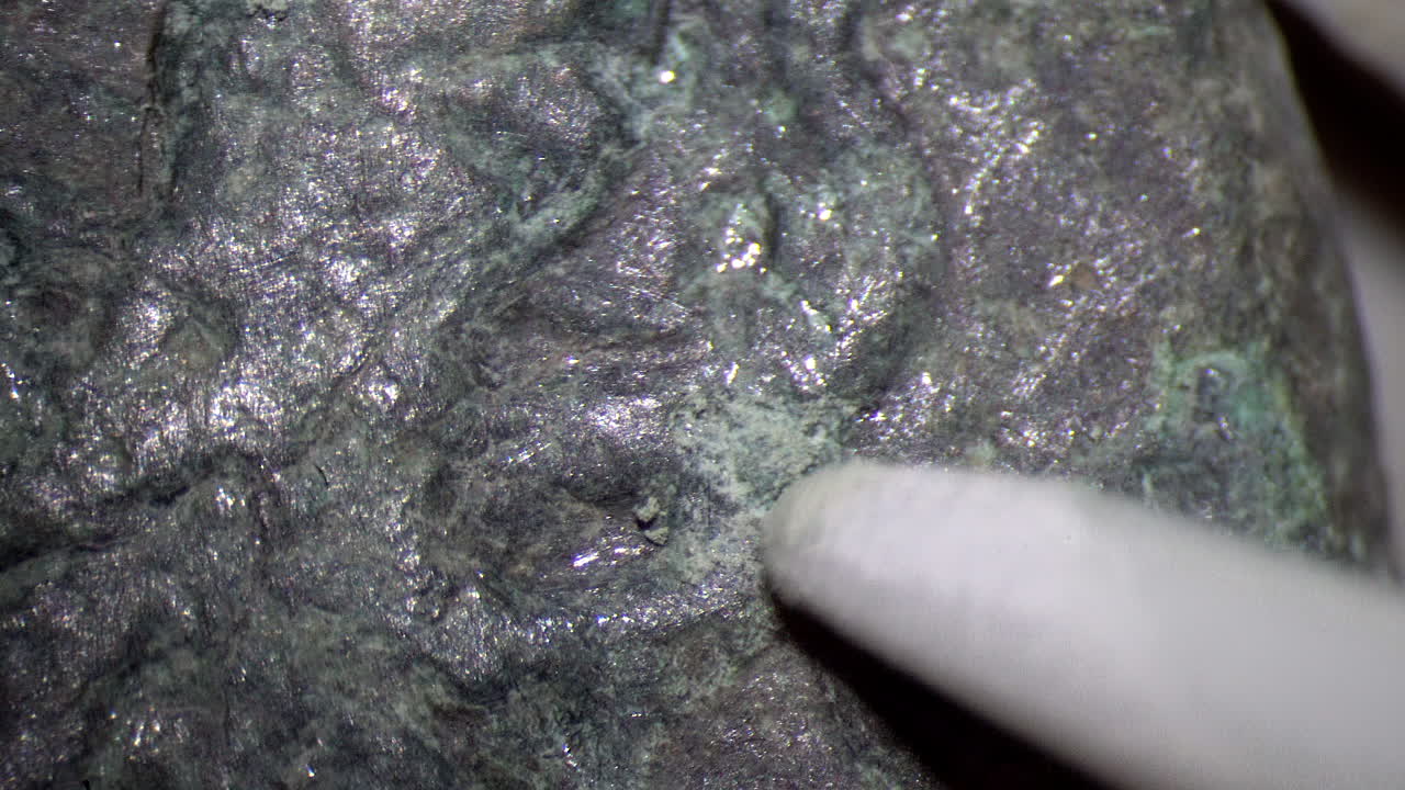 Fiberglass pencil cleans corrosion from ancient coin of Syracuse