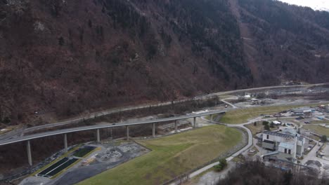Scenic-aerial-view-of-the-Egratz-Viaduct-bridge-in-a-valley-in-the-French-Alps