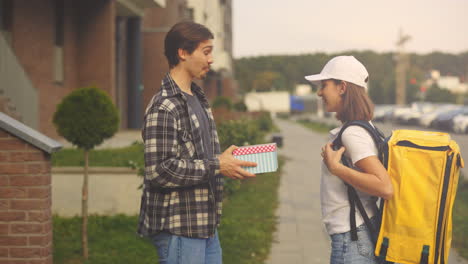 delivery person giving a gift