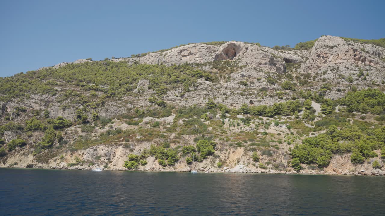 Coastal Landscape with Rocky Cliffs and Lush Vegetation