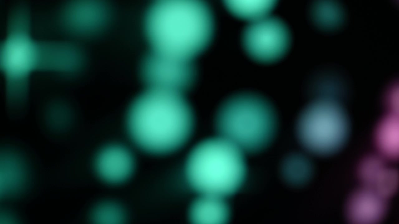 Sfondo astratto con luci bokeh verde acqua e viola