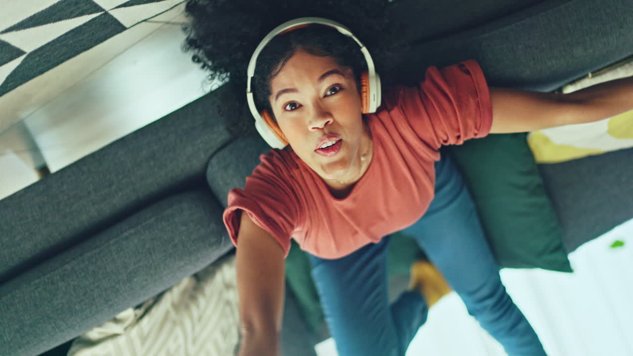 Headphones, listening and dance of black woman