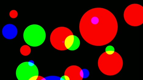 Computerized-animation-of-colorful-circles-of-various-sizes,-flickering-with-various-intensity,-on-black-background