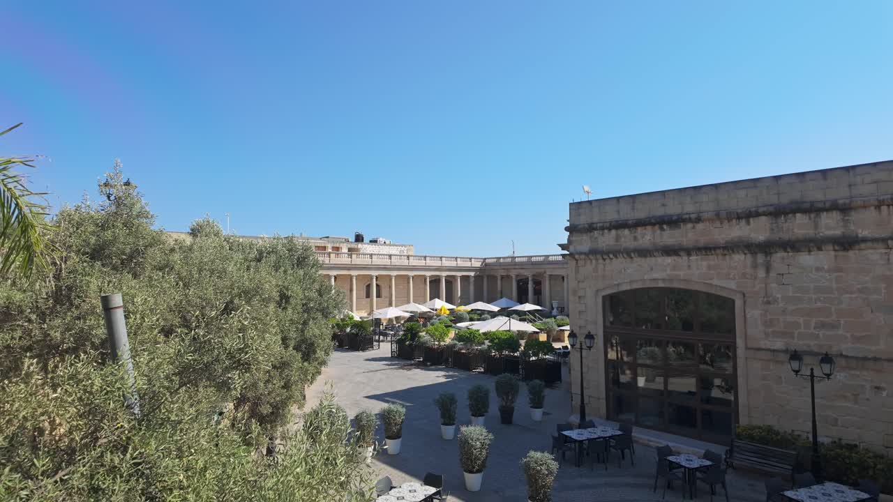 Garden area for restaurant and bar as part of the Montekristo Estate venue complex on a sunny summer day in Malta