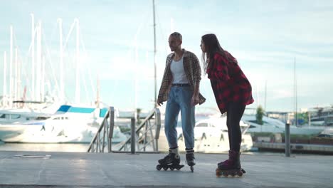 happy friends riding roller skates together