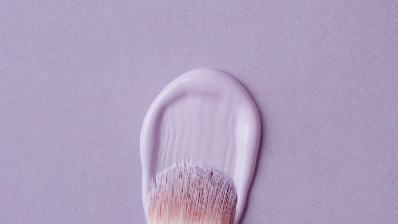 Purple Paint Brush Stroke on Lavender Background