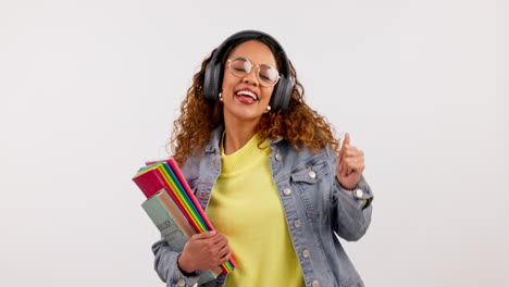 student, woman is dancing with books