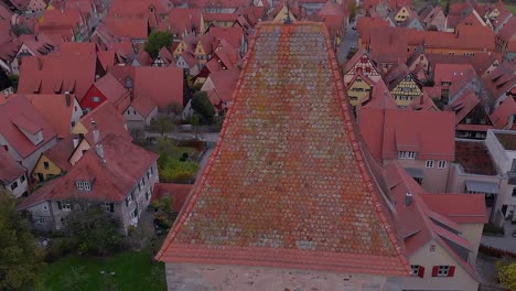 over the roof of city watchtower in the stone wall