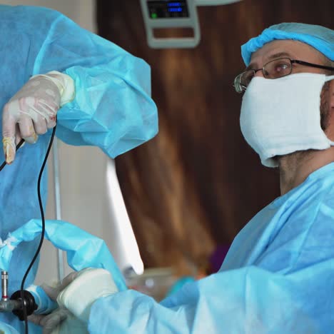 medical specialists in the operating theater. surgeons perform an operation using modern medical tools in the hospital.