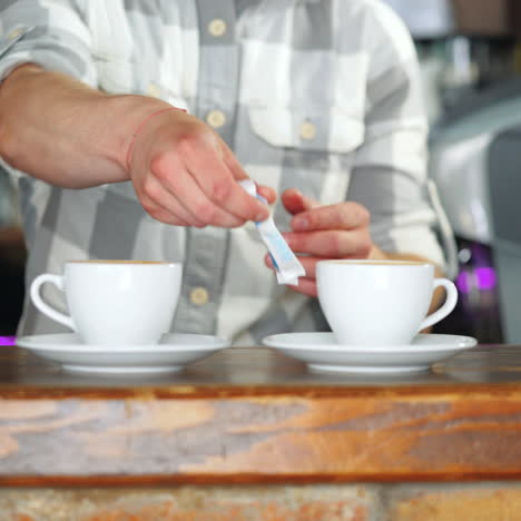 barista serves two cups of coffee. ?oncept of services and drinks. sqare video
