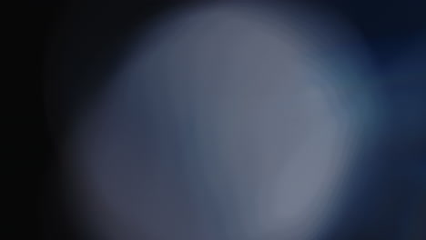 la luz multicolor filtra imágenes de 4k sobre fondo negro, vídeo estilizado, transiciones, efecto bokeh