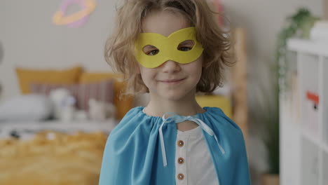 child in superhero costume
