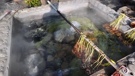 eggs boiling in hot springs of chiang rai thailand traditional eco friendly way