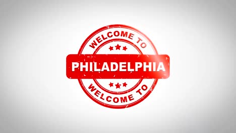 welcome to philadelphia signed stamping text wooden stamp animation. red ink on clean white paper surface background with green matte background included.