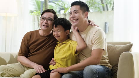 Asian-men-and-boy-in-the-living-room