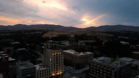 flying the drone behind the idaho capitol as the sun rises behind the foothills