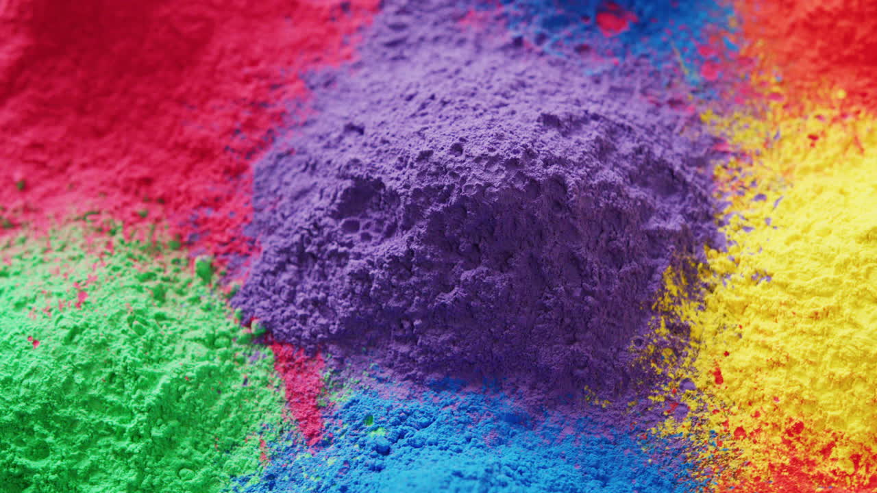 Video in primo piano di polveri multicolori con spazio per il testo