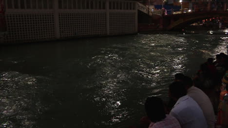 massive flow of the ganges river water in haridwar, slow motion pan shot.