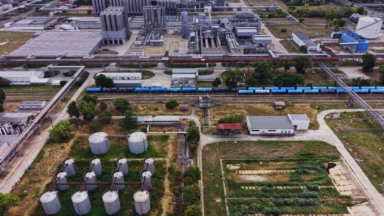 Gasoline production site with storage tanks and industrial facilities