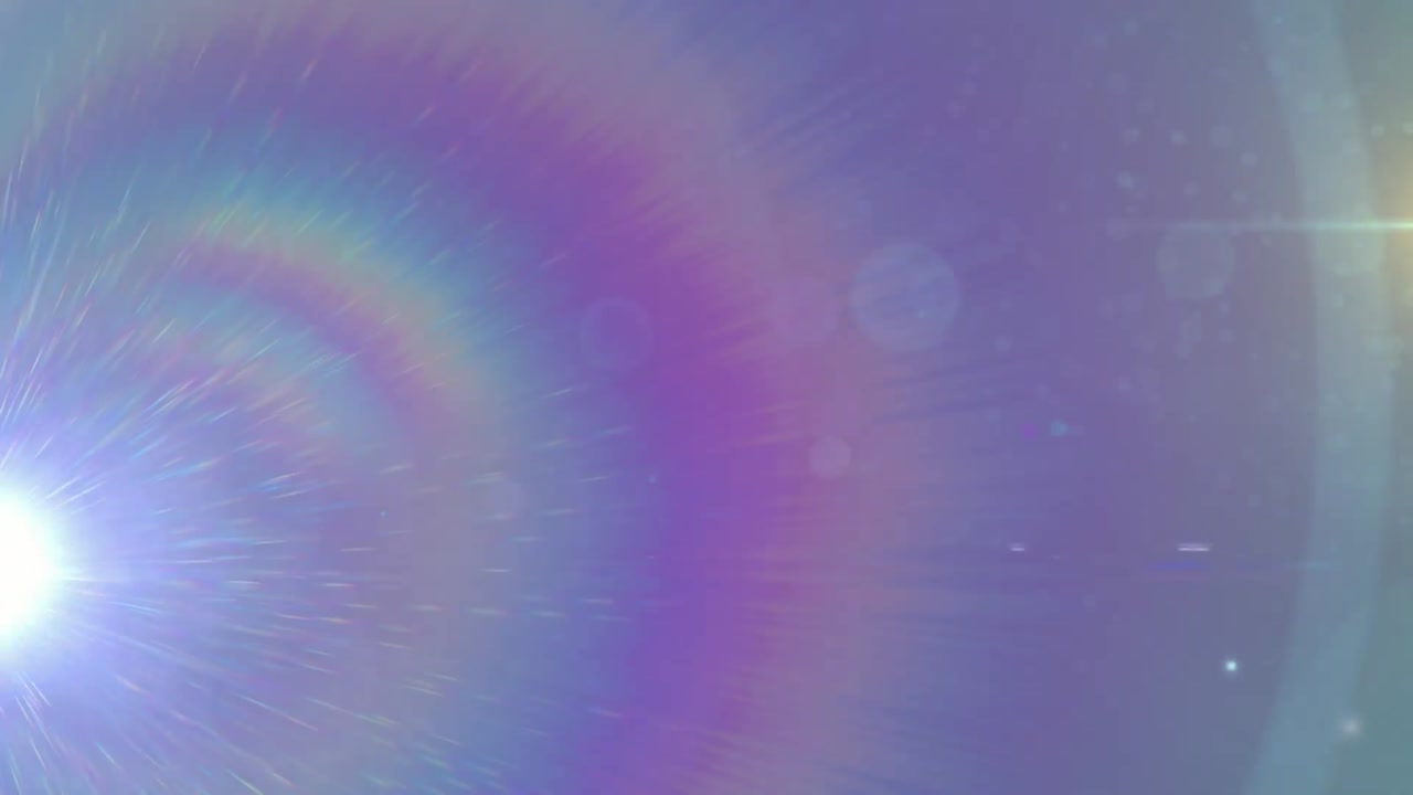 punto de luz contra el destello de la lente del arco iris