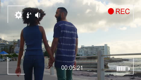 holding hands and walking, couple over camera recording animation