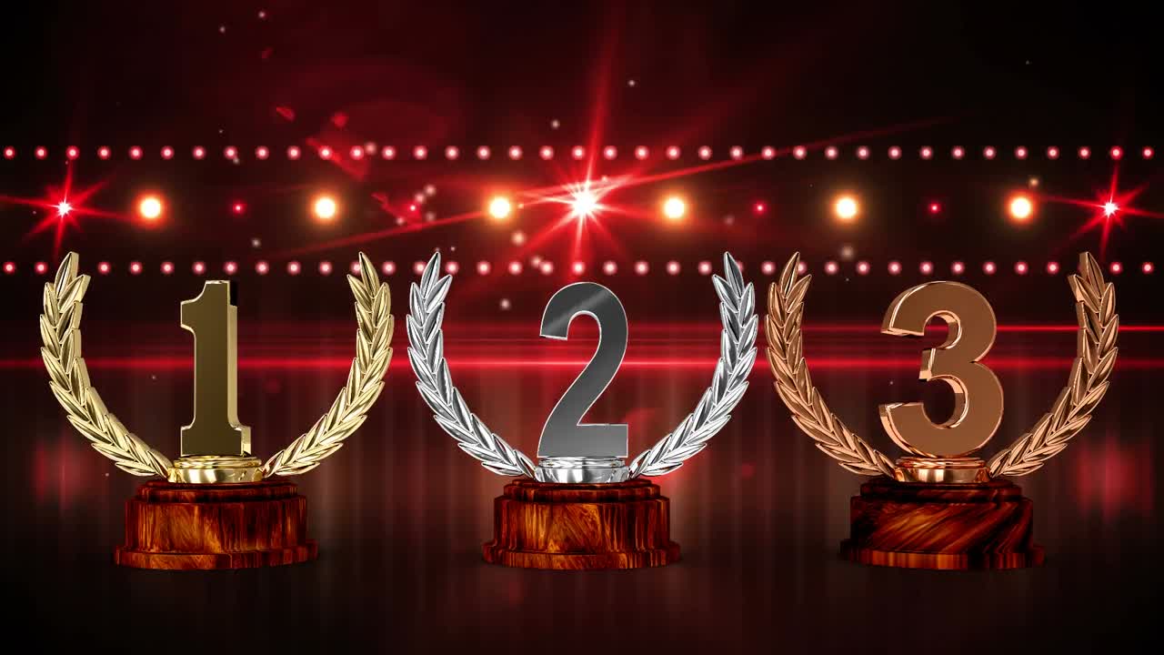 Animation of first, second and third place award trophies at floodlit winners' prize giving ceremony