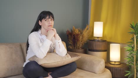 portrait of sad woman at night at home.