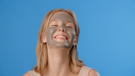 woman with clay face mask