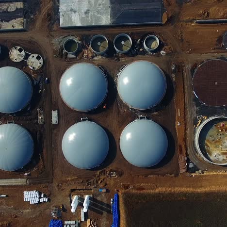 process of building plant for sustainable production of biofuel. bio gas factory. modern plant. aerial view on the modern biofuel factory. view from above