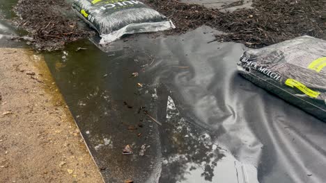 Rainy-day-on-landscape-sight-with-mulch